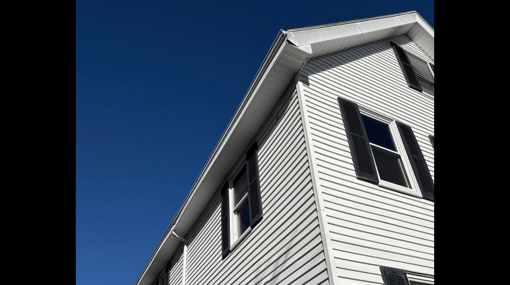 Professional siding installation by Peak Quality Roofing