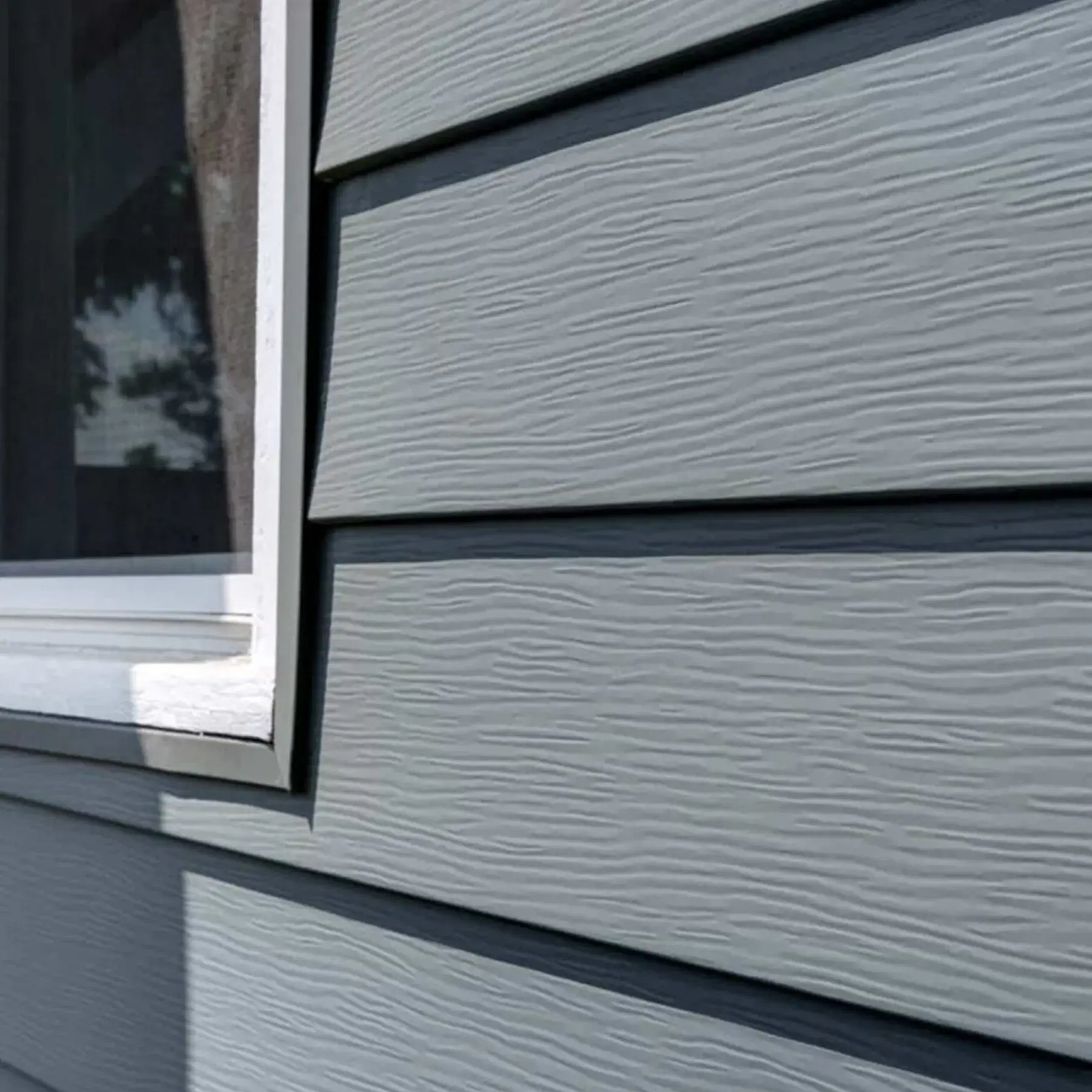 Low maintenance vinyl siding panels installed on house