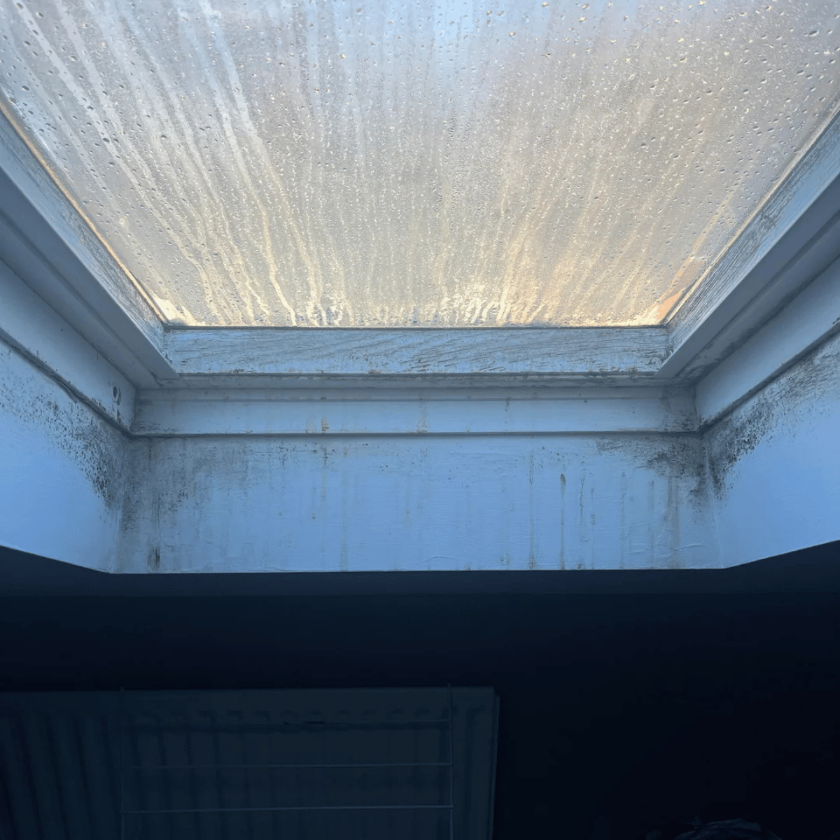 Foggy skylight glass due to failed seal and trapped moisture between panes