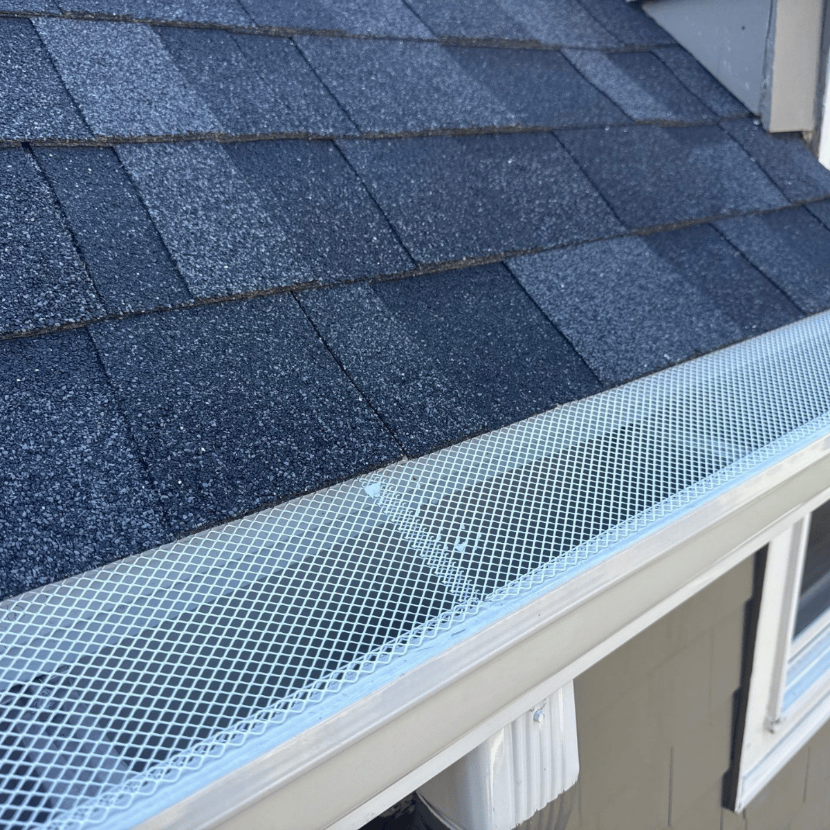 Gutter guard mesh system installed to prevent clogs in Massachusetts