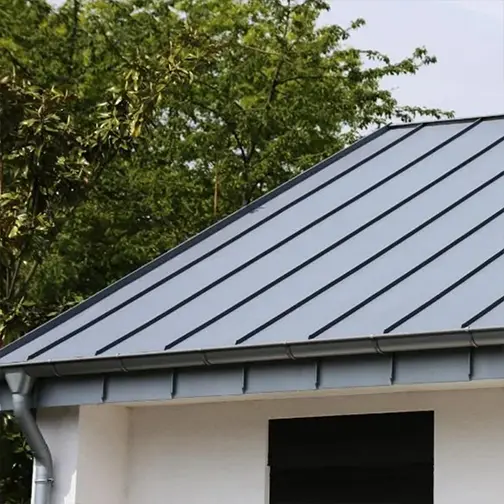 Standing seam metal roof installed on a Massachusetts home