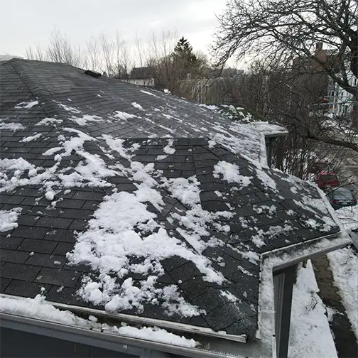roof edge affected by snow and ice