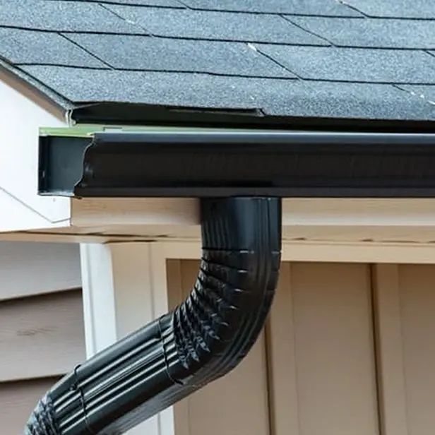 Seamless gutter and downspout system on home in Greater Boston MA