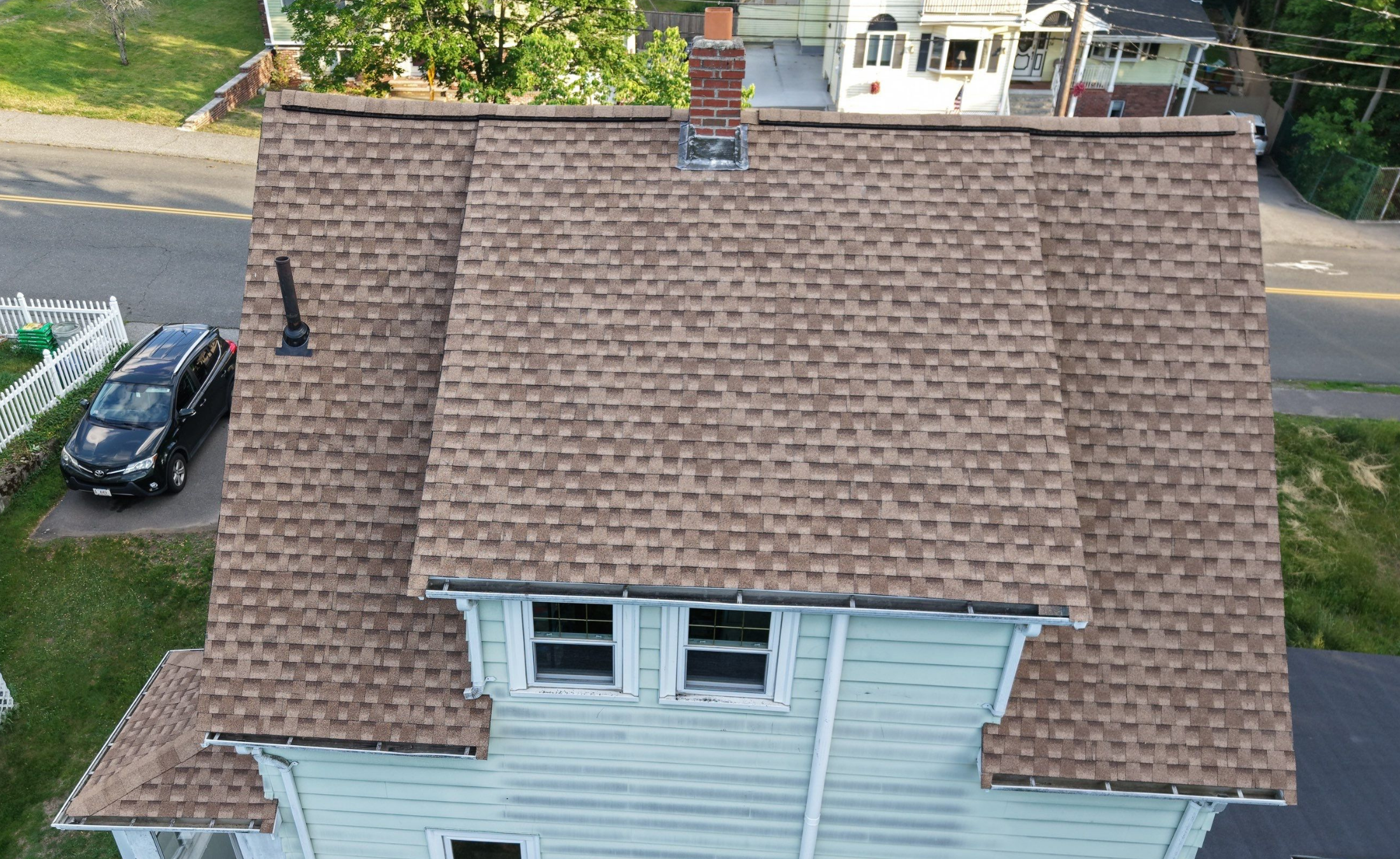 Storm-damaged asphalt shingle roof repair completed in Stoneham MA
