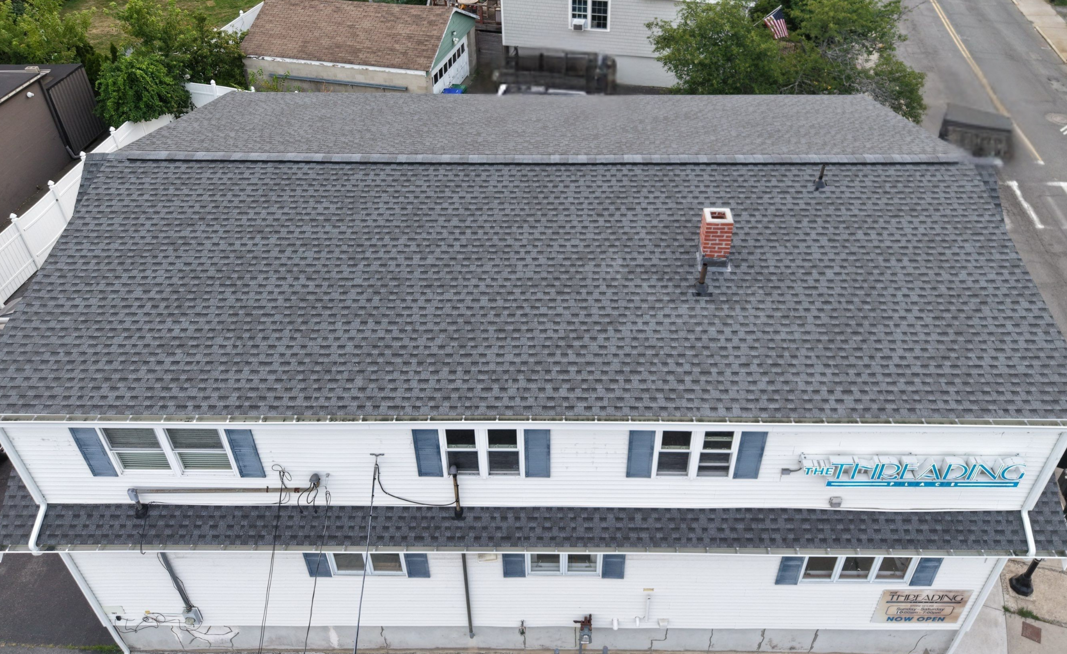 Flat roof replacement and tear-off on a multi-family property in Medford MA