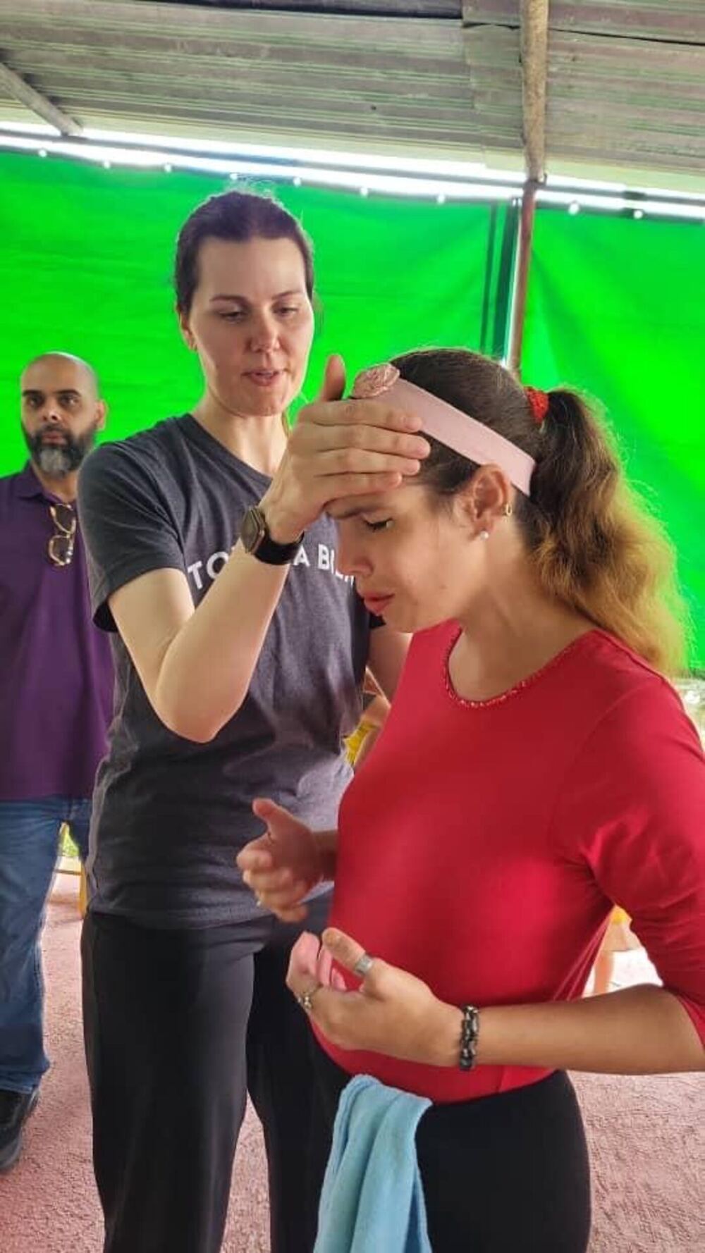 Rachel praying with healing prayer in Cuba