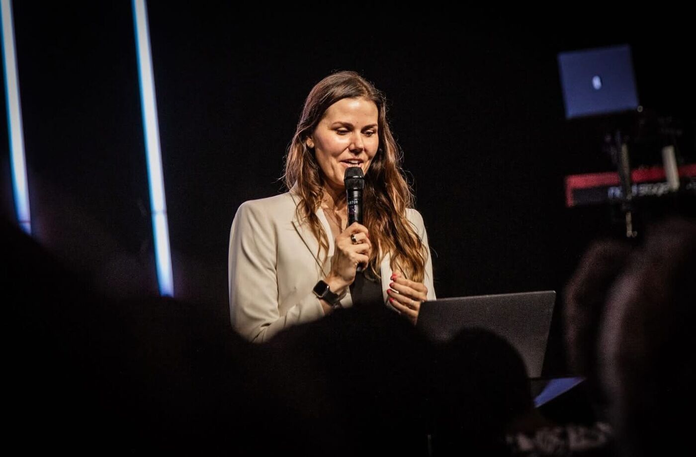 Rachel Ngom speaking on stage
