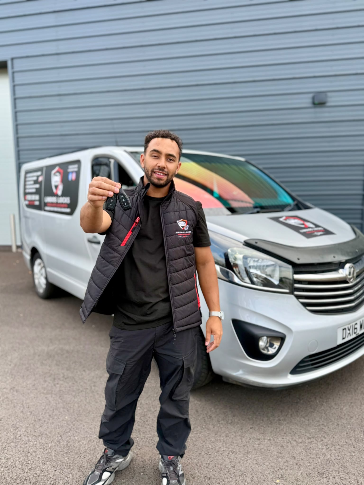 Lindos Locks cutting and programming a car key on-site in Telford