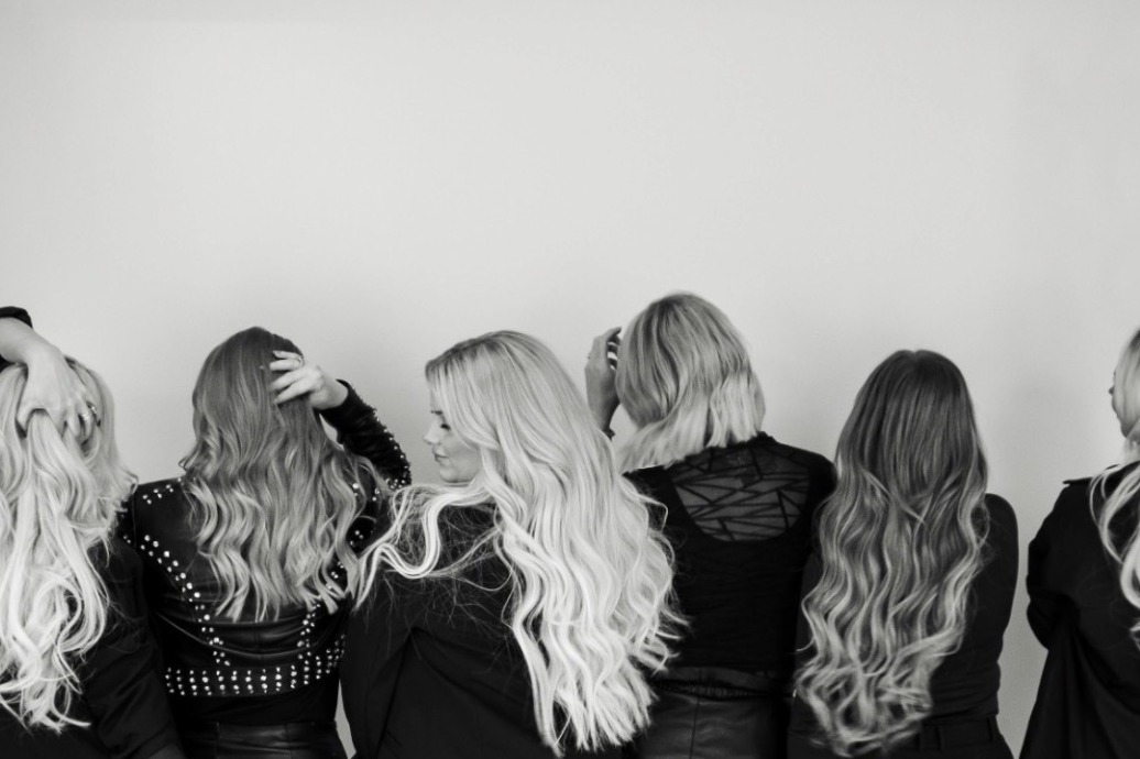 Stylists wearing OSIX extensions