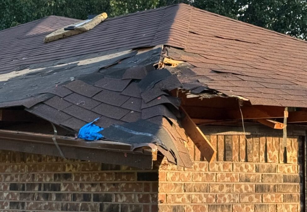Emergency roof restoration after a fallen tree