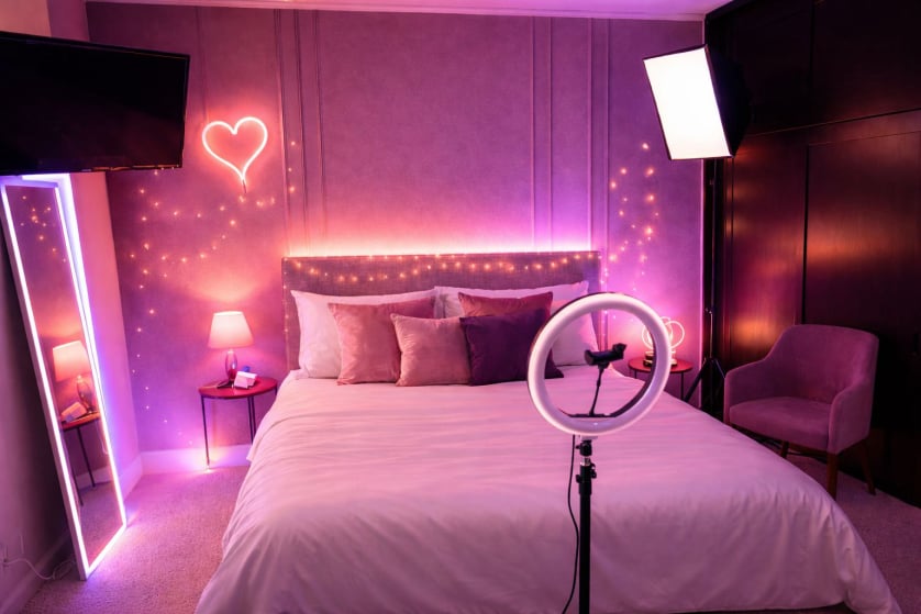 Gem Models studio room with accent lighting, mirror, and prepared filming equipment.