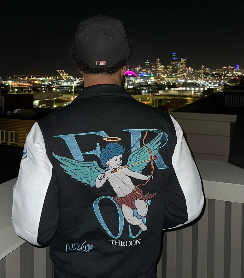 Back of the jacket against the Seattle skyline at night