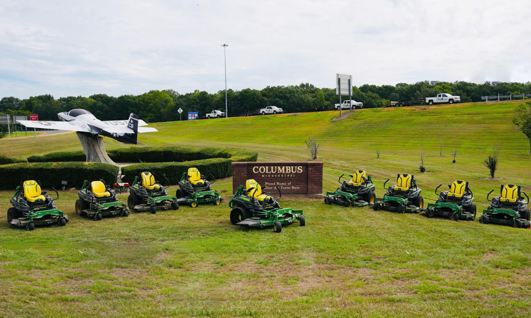 Columbus, MS municipal exit grass cut and showing the companies fleet