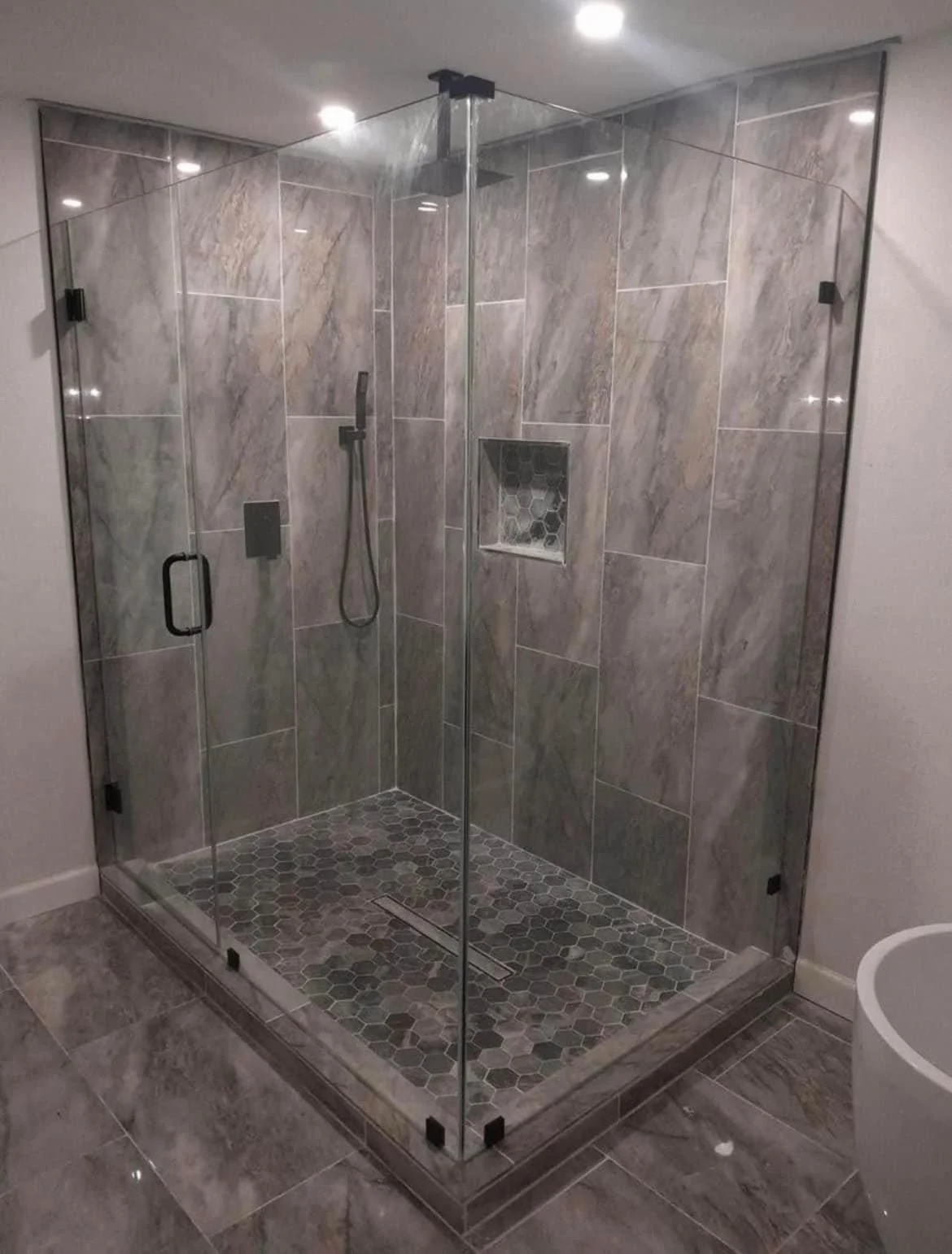 Door with inline panel and 90 degree return