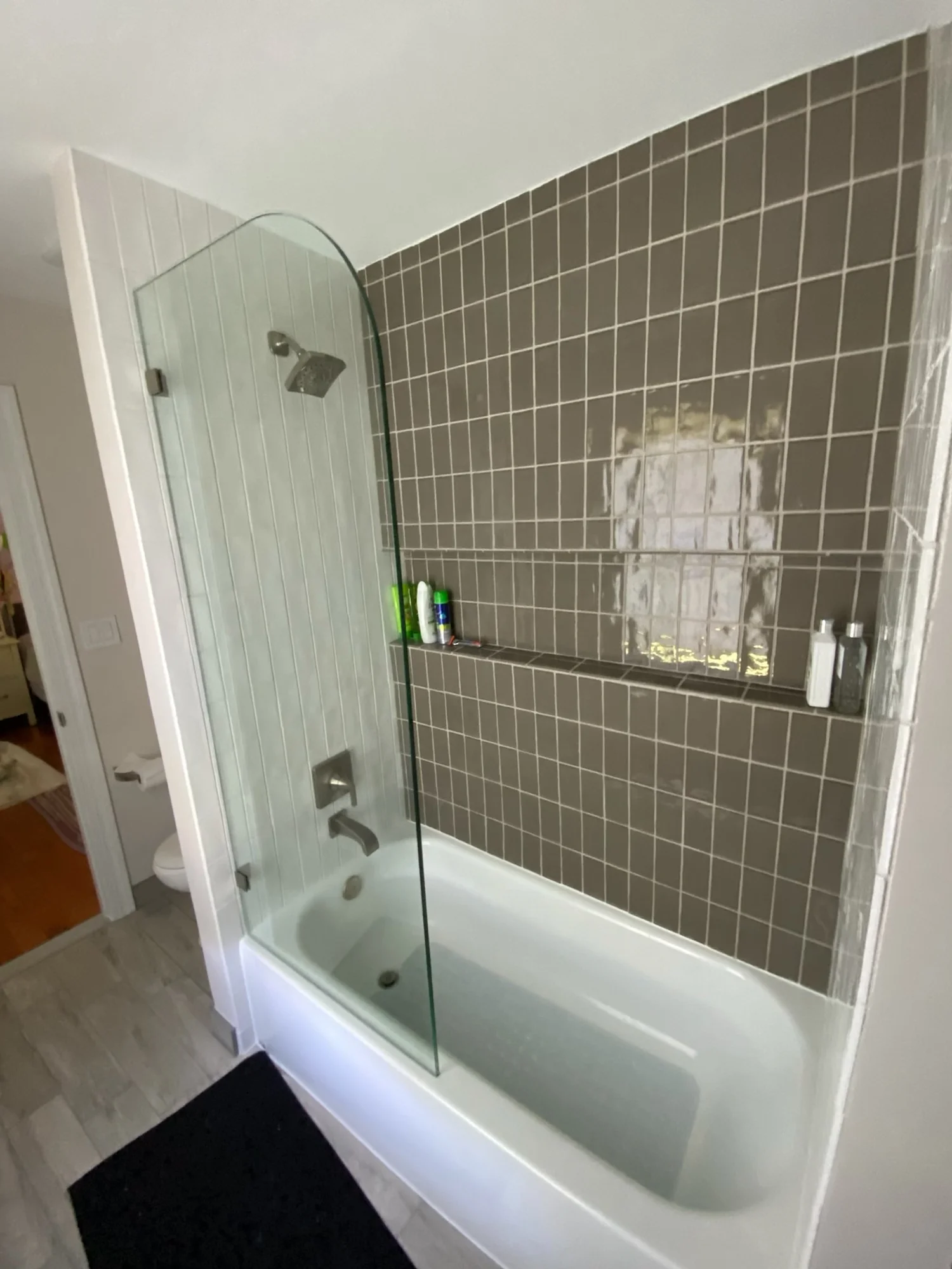 Roman-style shower (no door) on bathtub