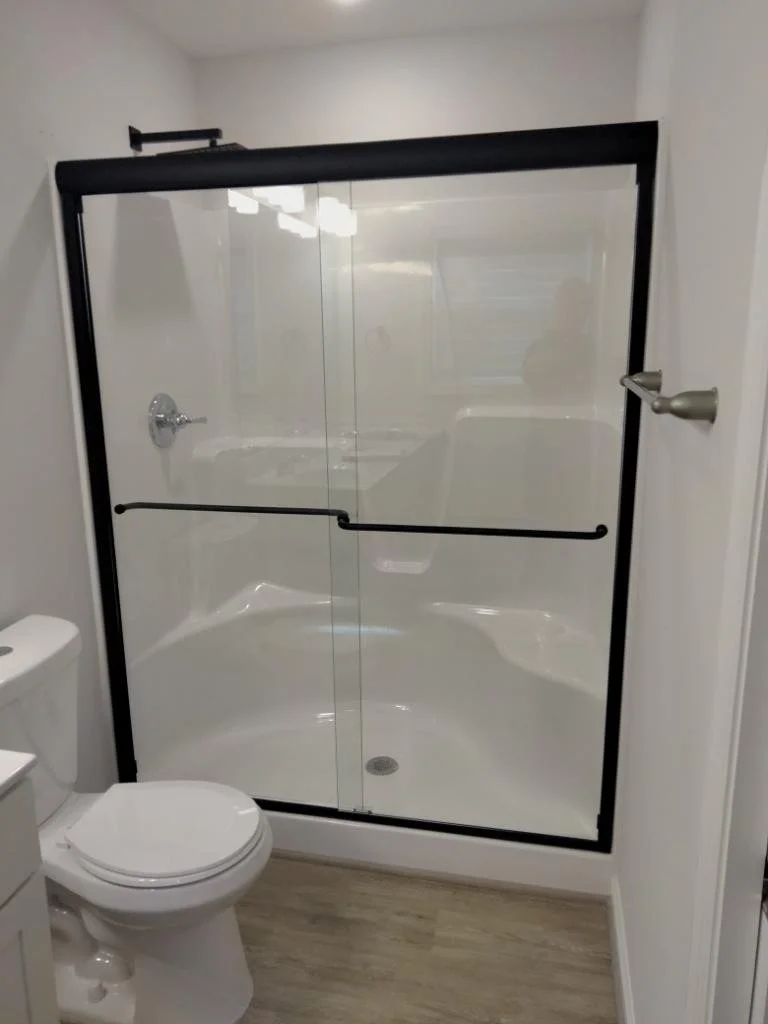Sliding glass shower door with Matte Black frame