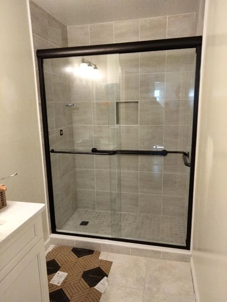 Sliding glass shower doors with Matte Black frame