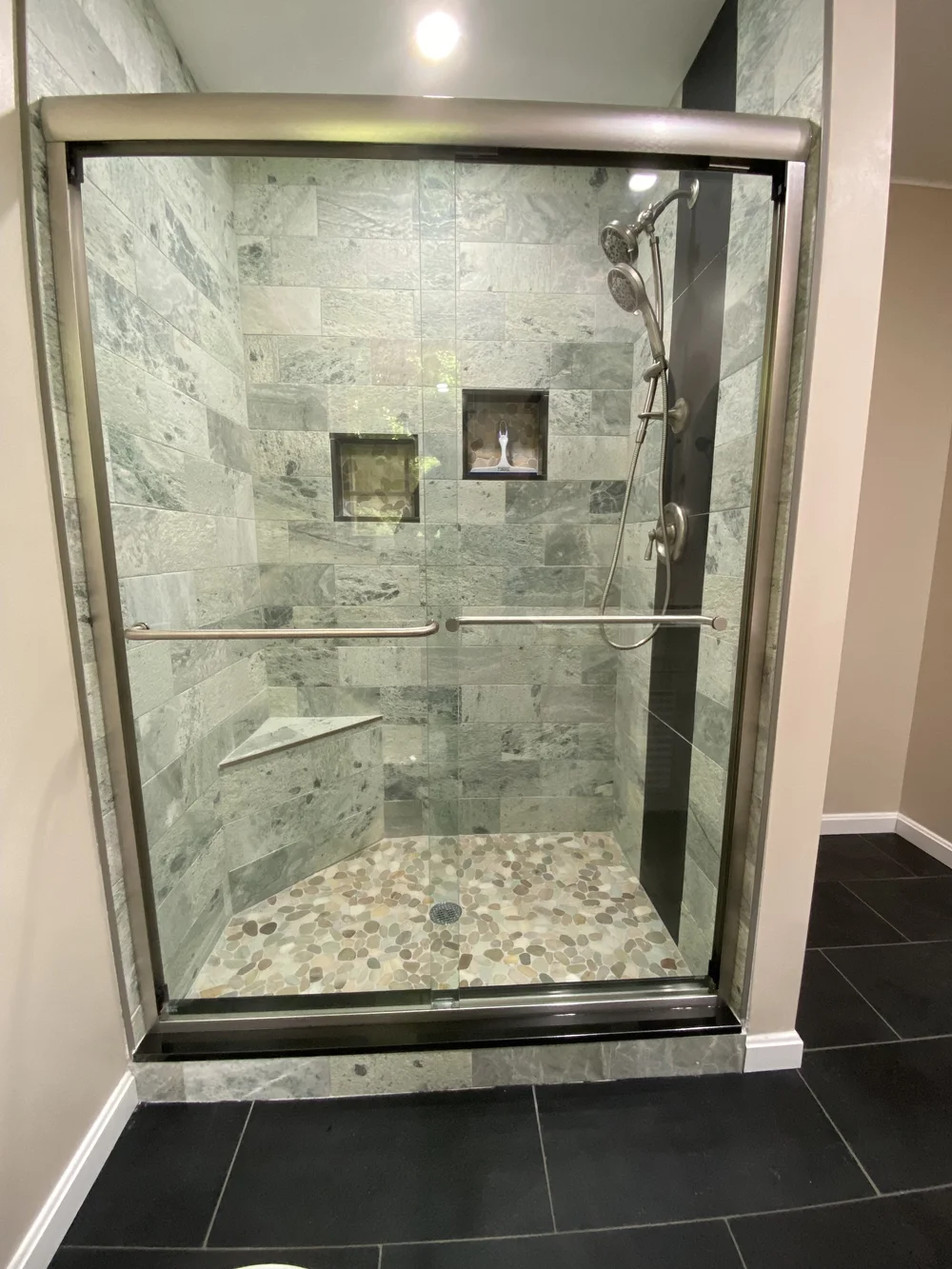 Sliding glass shower door with Brushed Nickel frame