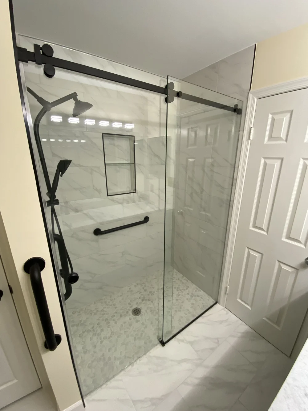 Barn door style door with Matte Black hardware