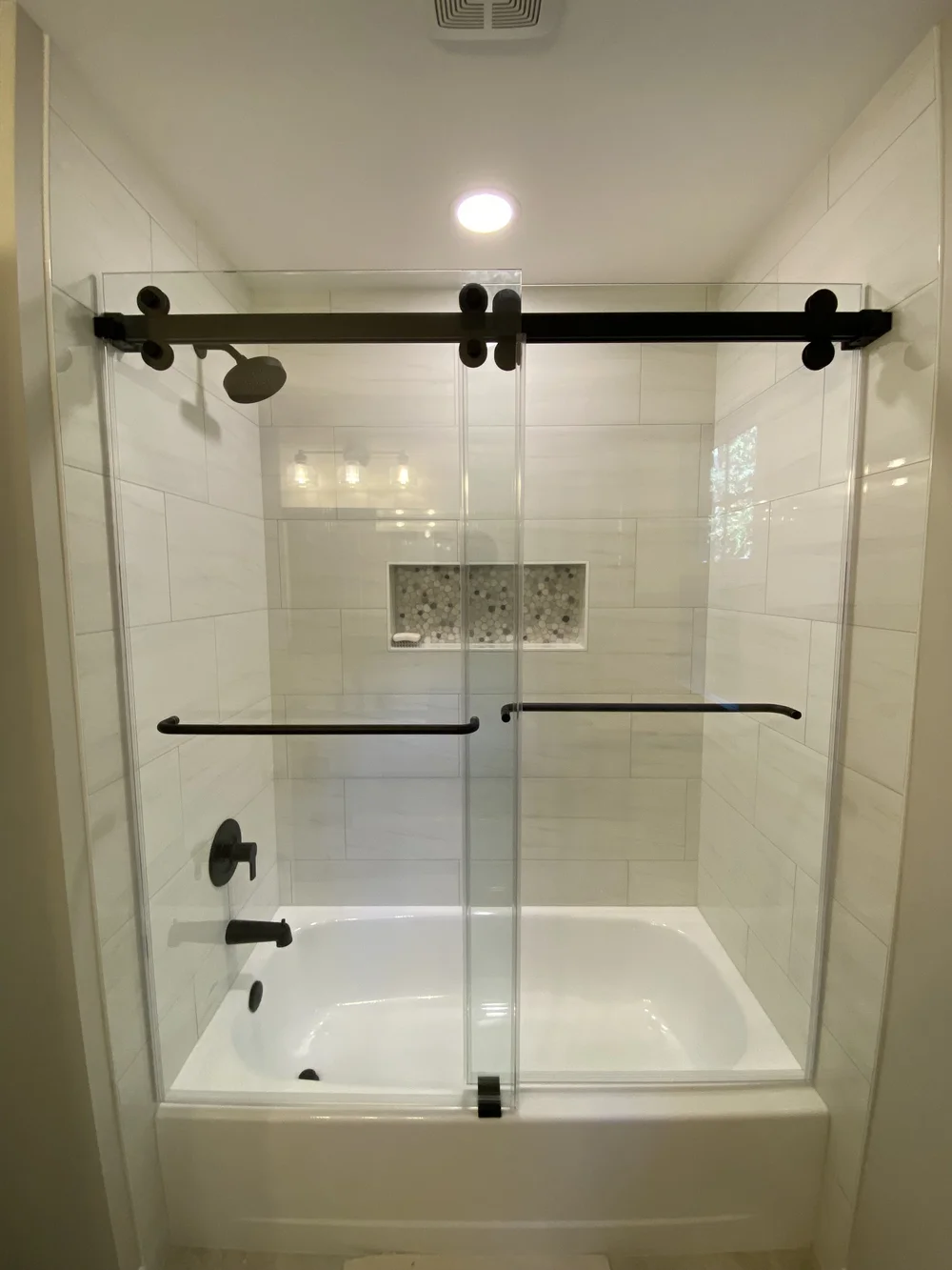 Sliding tub enclosure