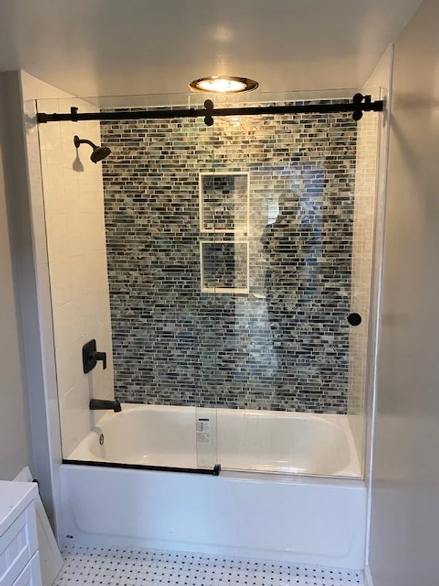 Heavy glass barn style tub slider