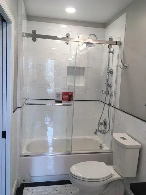 Dual barn style sliders on tub