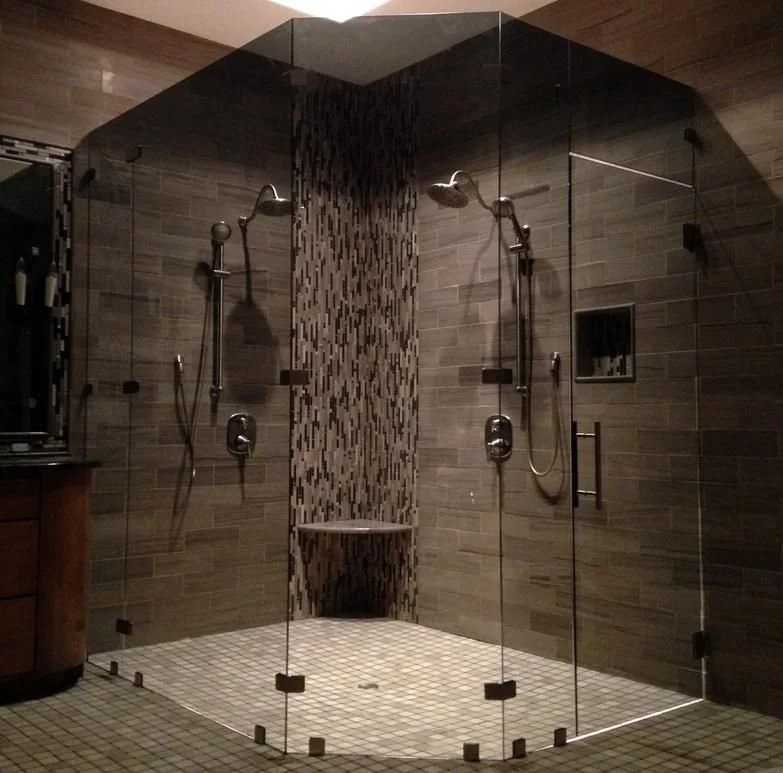 Tinted glass neo-angle steam unit with 145 degree panels and transom