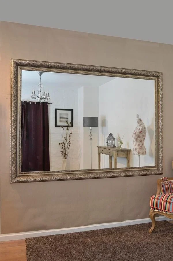 Framed mirror for family room