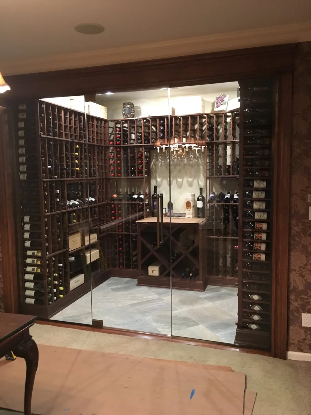 Wine room with pivot doors
