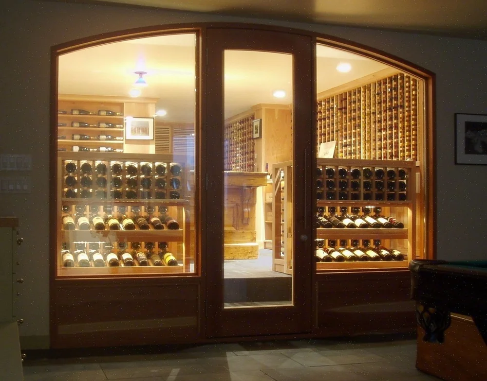 Wine room with specially cut glass panels