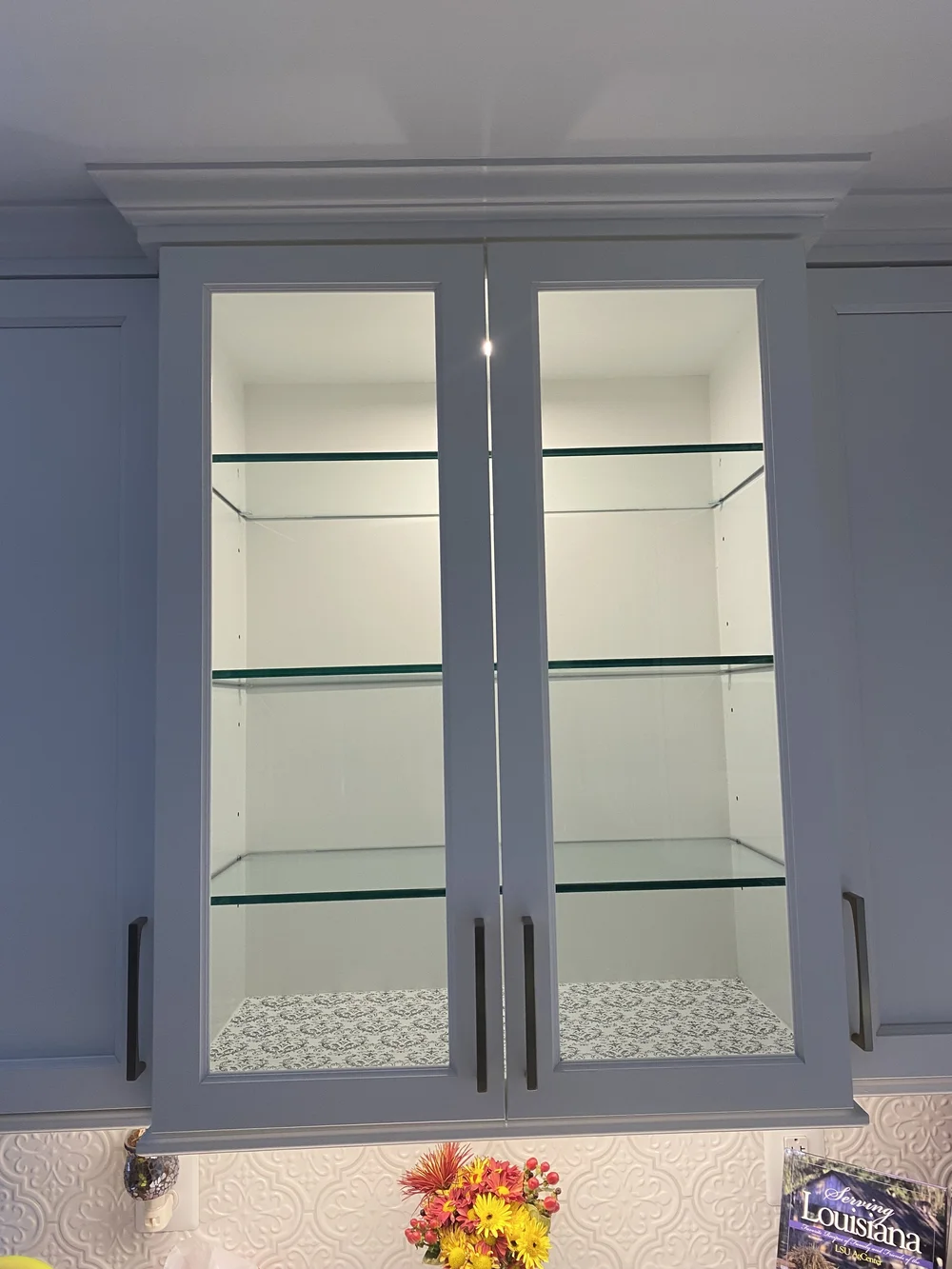Glass shelves in cabinet