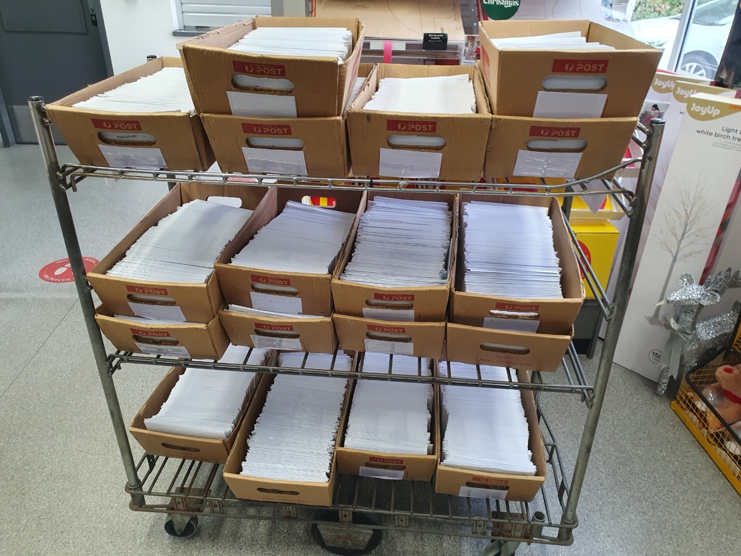 Australia Post trays loaded with flyers for letterbox distribution