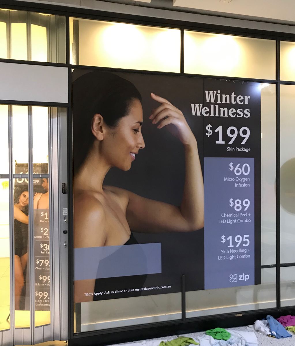 Winter Wellness window poster in a Results Laser Clinic store