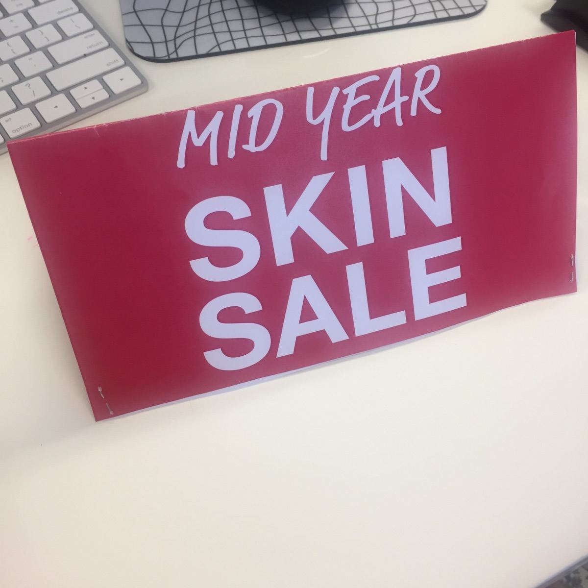 Mid Year Skin Sale printed sign