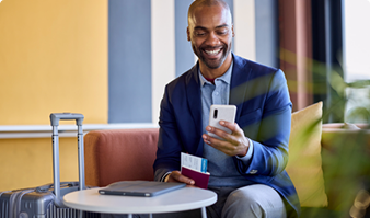 Traveler using mobile phone with international roaming enabled