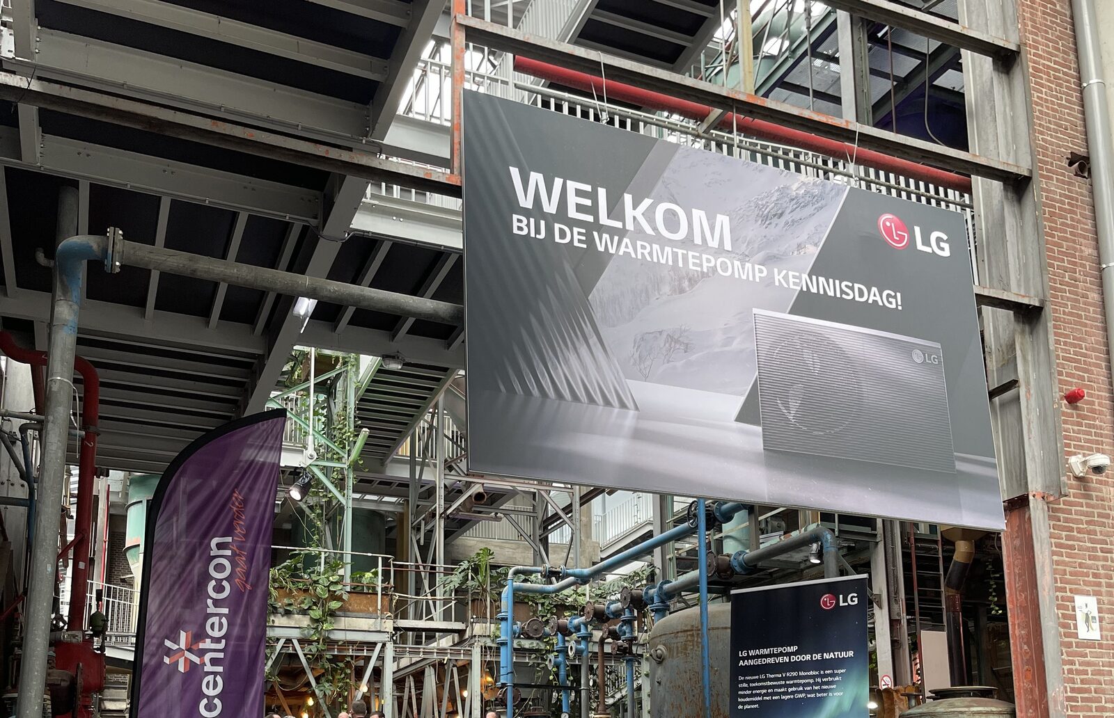 Welkomstdoek van LG bij de ingang van een kennisdag