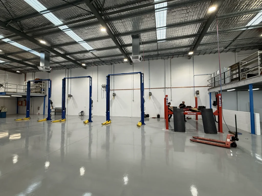 Workshop with compressed air lines to each bay