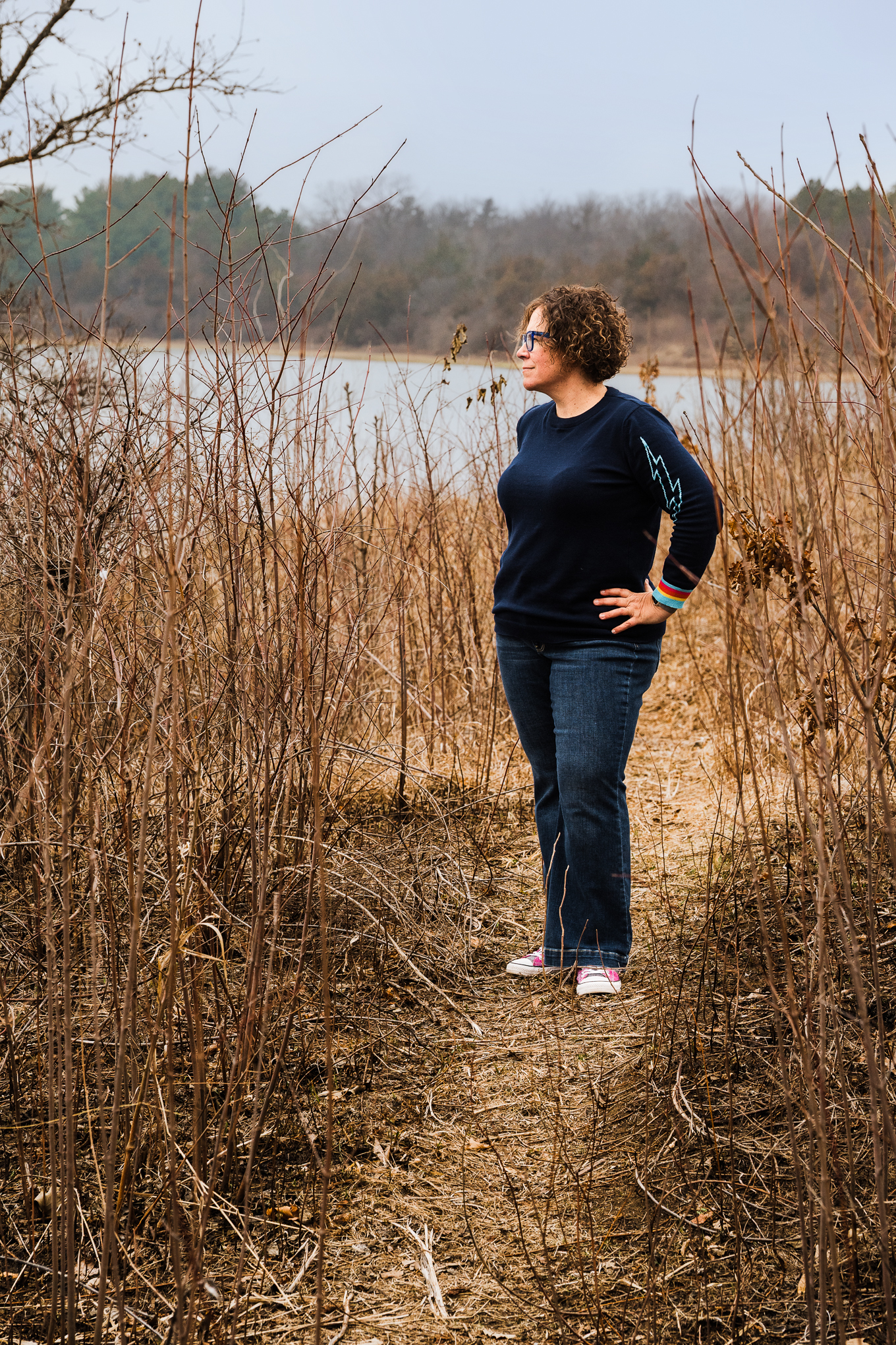 Wendi standing in a field outdoors