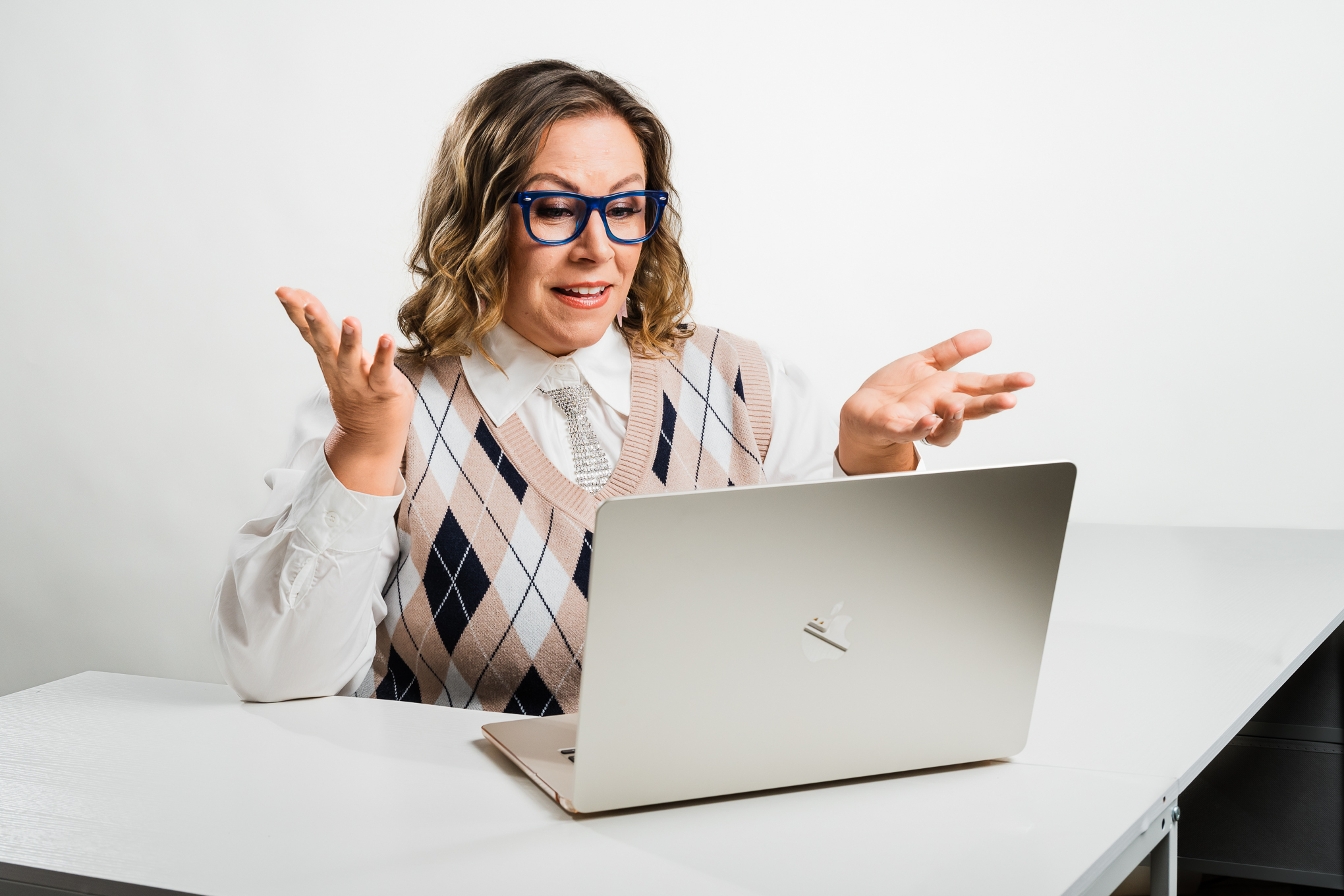Wendi Fredregill on a video call, talking with someone through her laptop