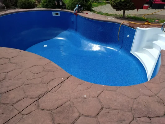 Piscine forme kidney avec nouveau liner