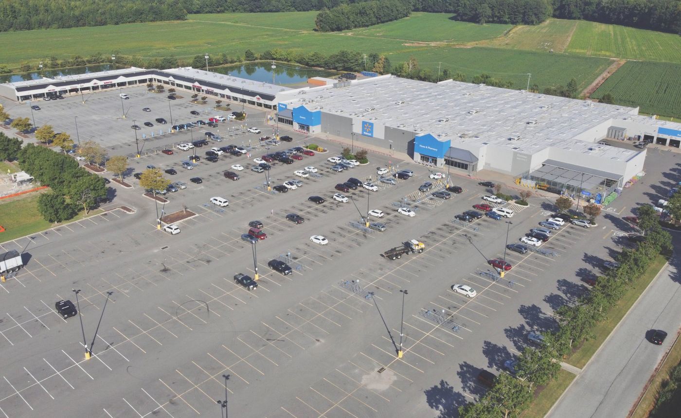 Aerial view of Franklin Commons Shopping Center and Walmart Supercenter