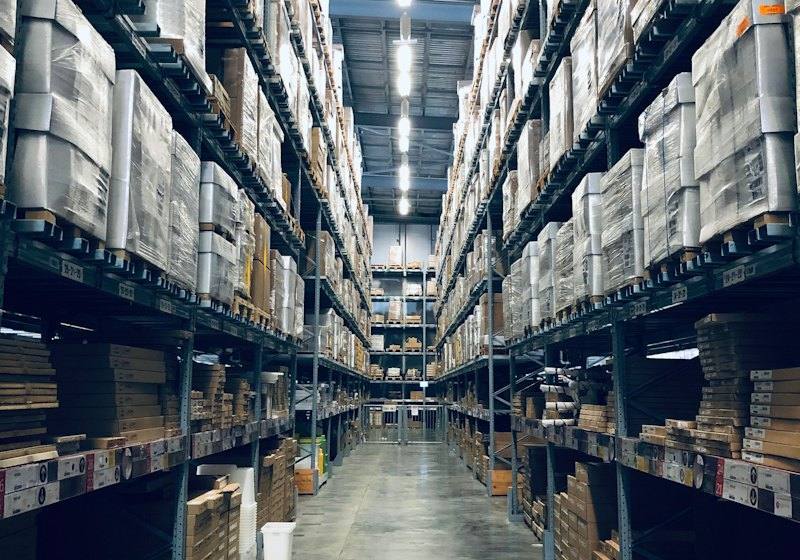 Warehouse aisle with stocked racking