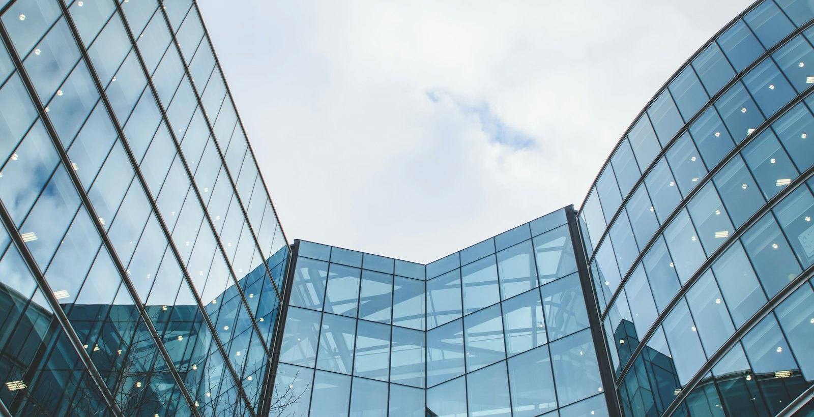 Modern glass office buildings against the sky