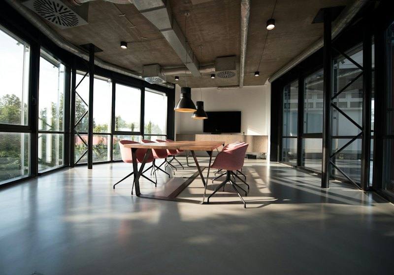 Open office space with floor-to-ceiling windows
