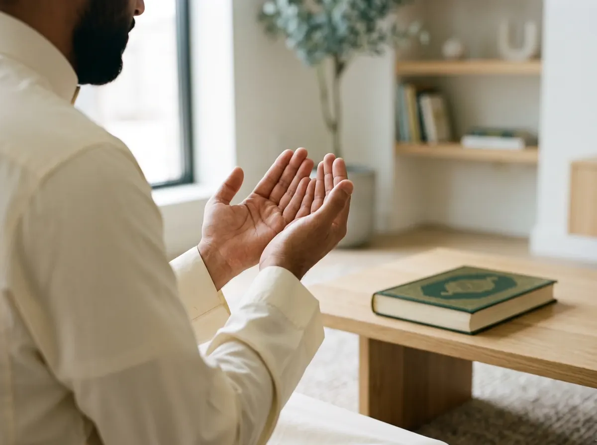 A man reciting Qur'an with hands raised, the Sunnah practice of ruqyah
