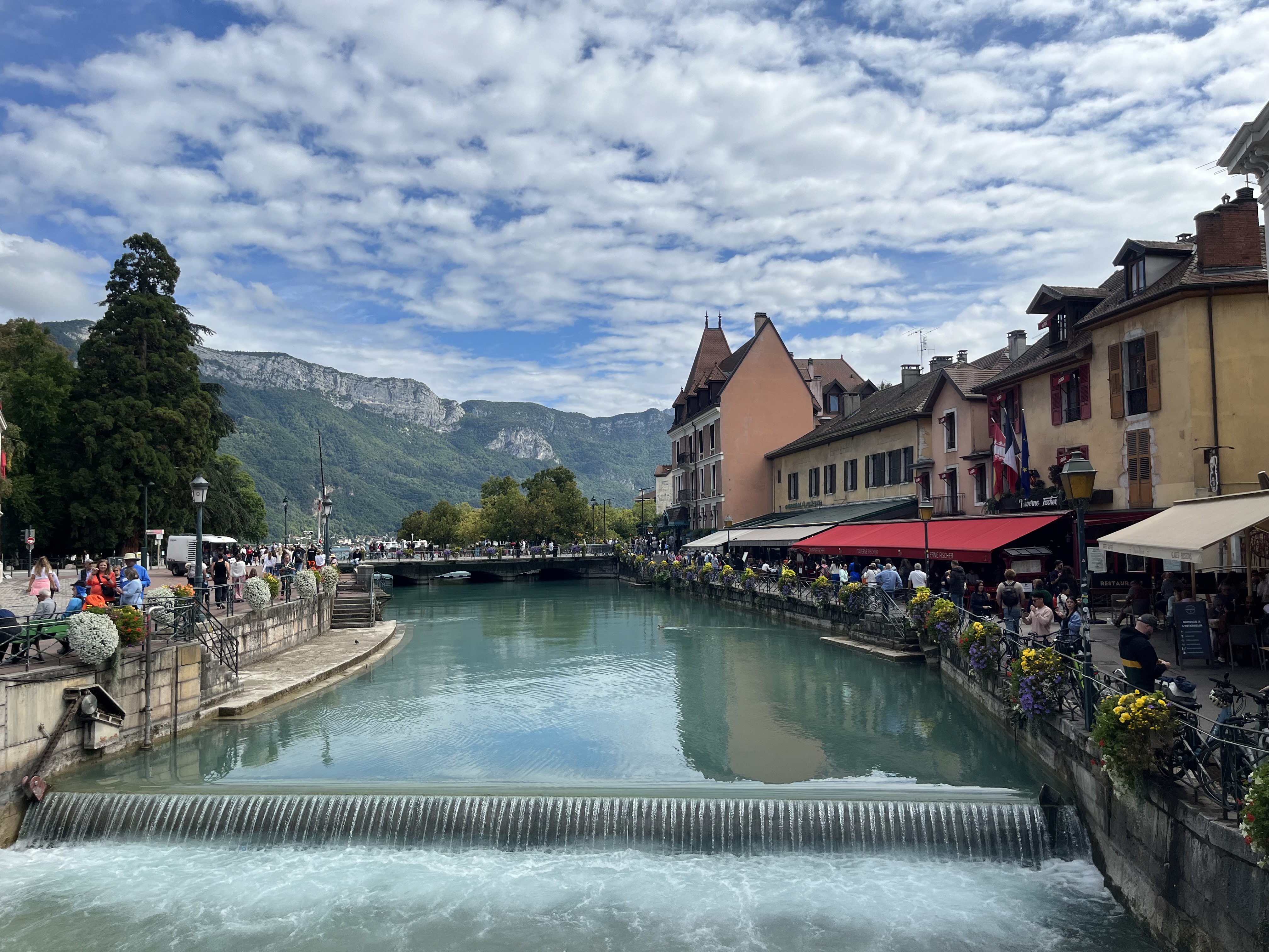 Annecy canal with the Alps mountains in the background, France