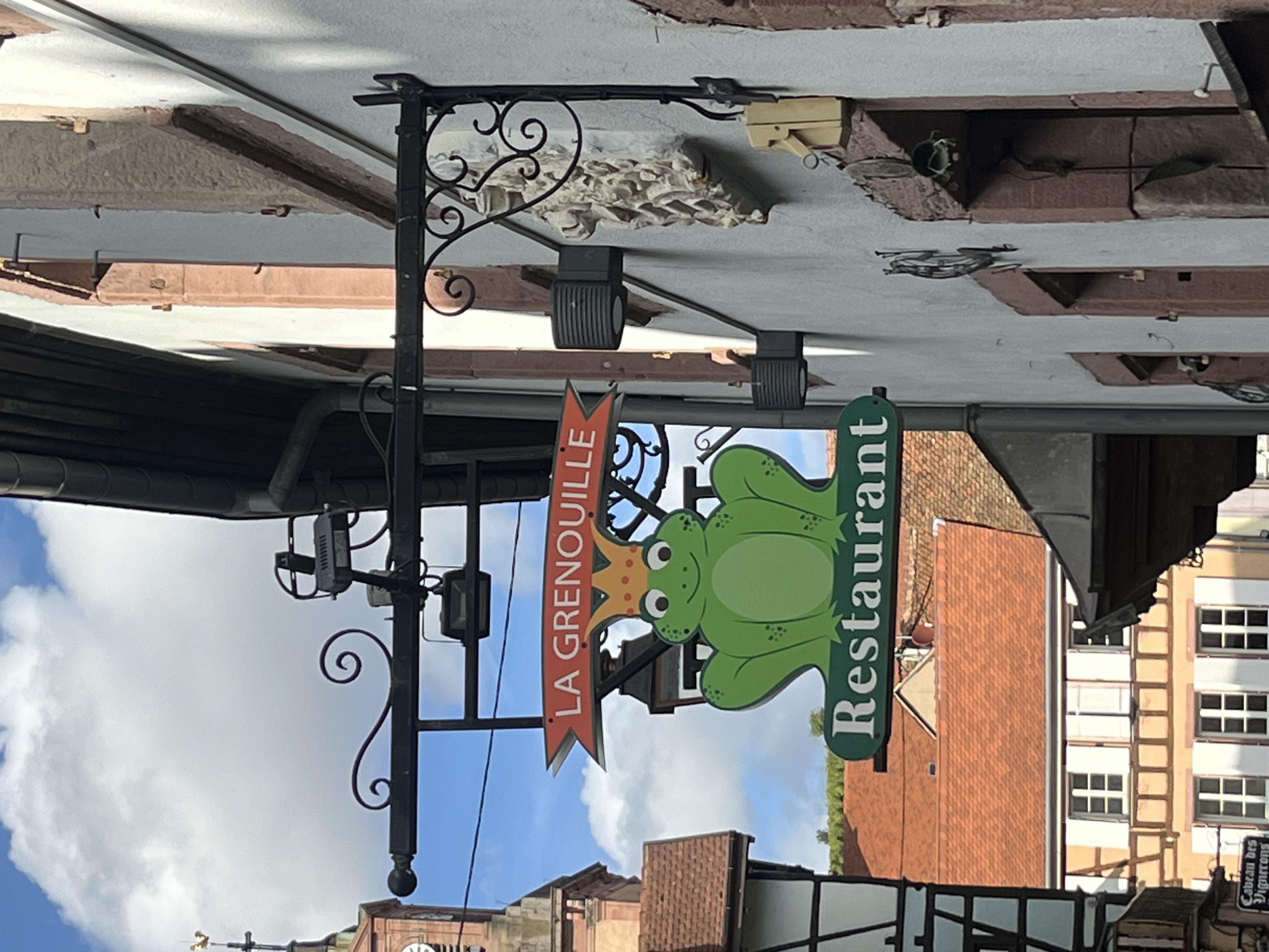 La Grenouille crowned frog restaurant sign
