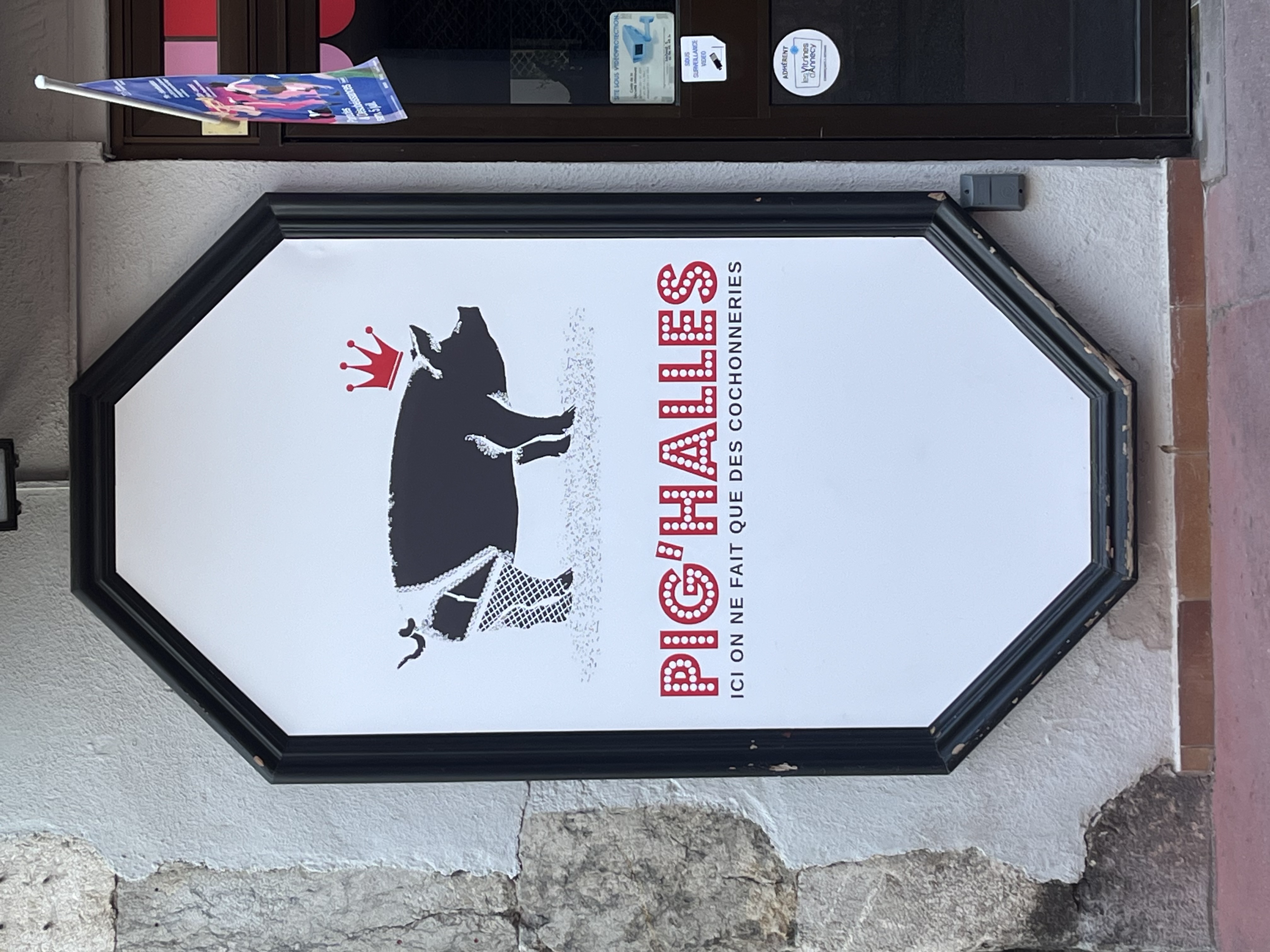 Pig'Halles crowned pig sign at Annecy market