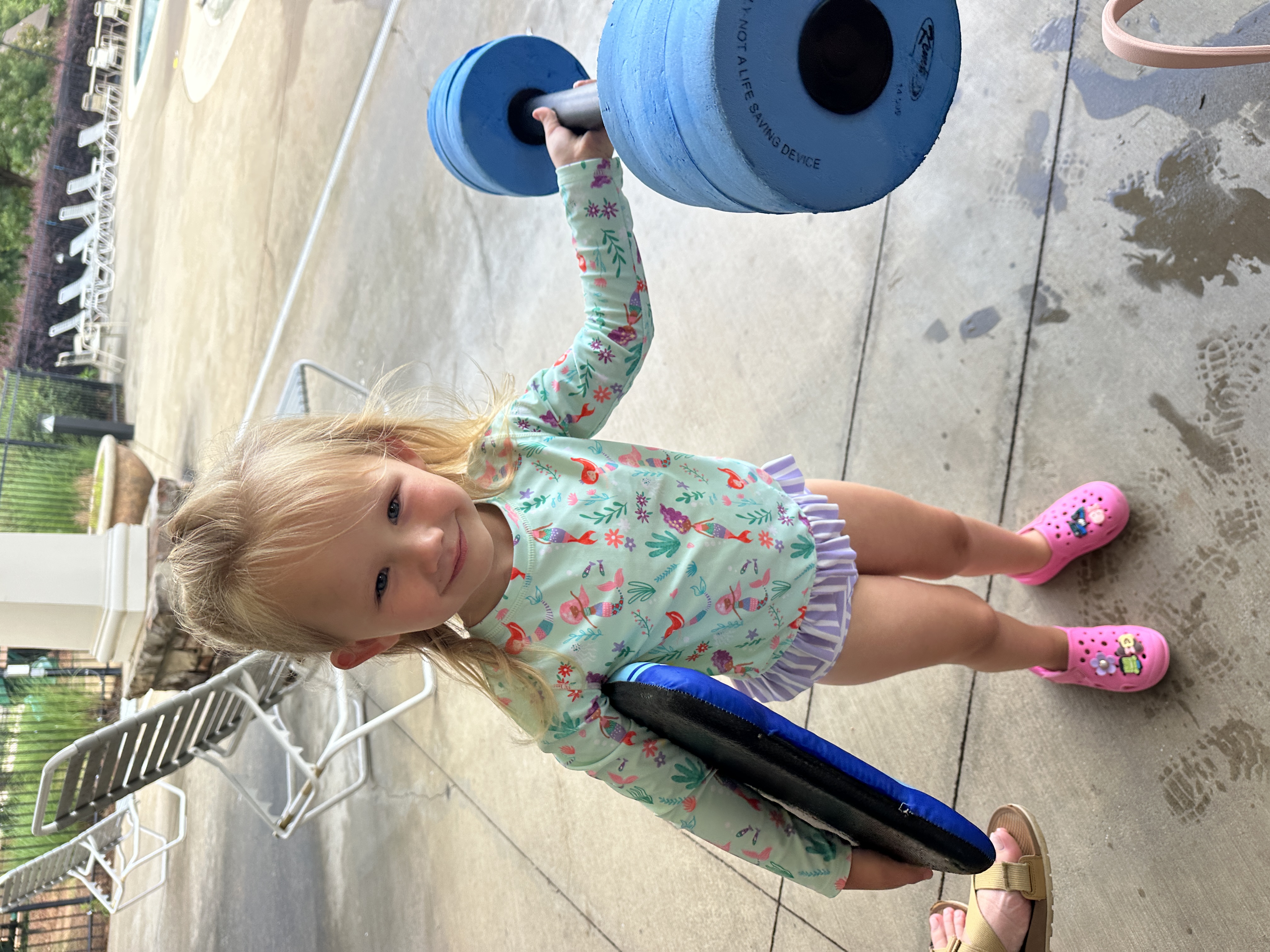 Student with swim equipment