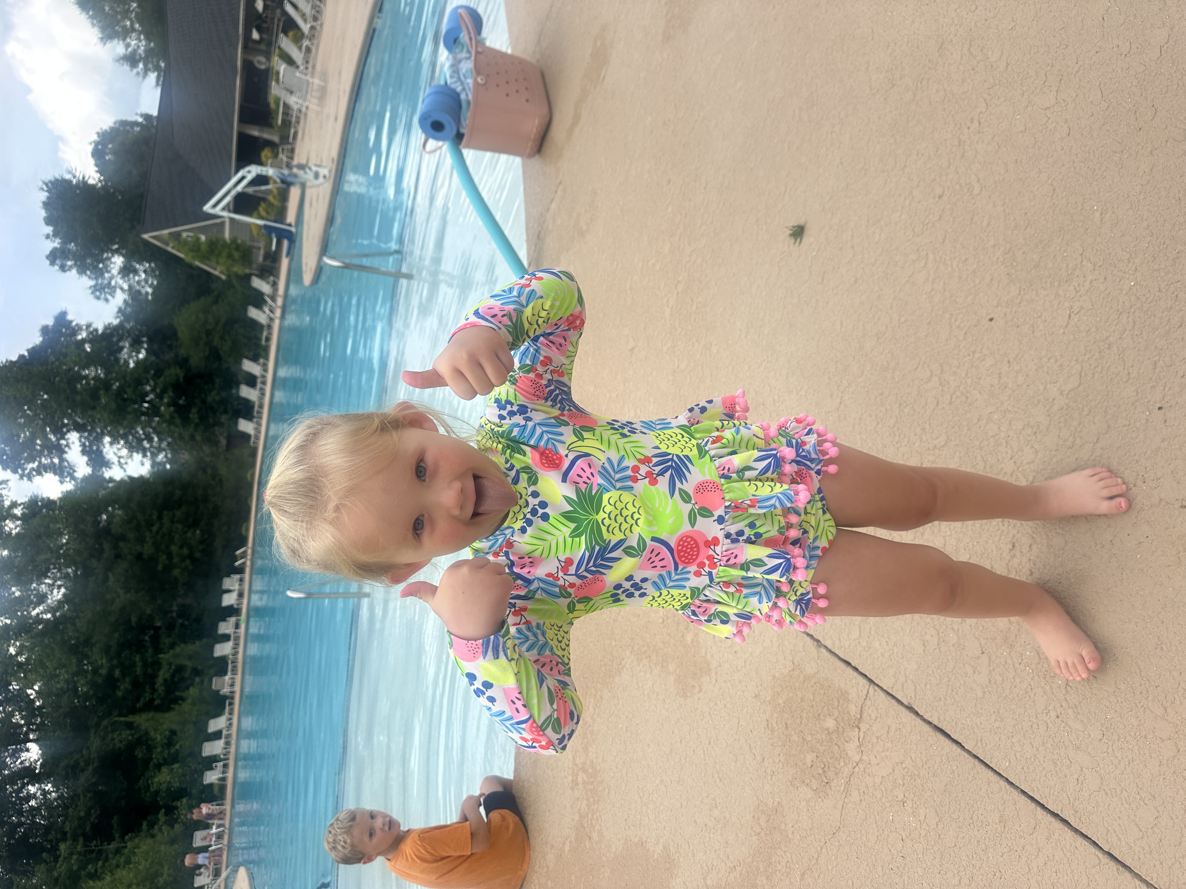 Excited young swimmer
